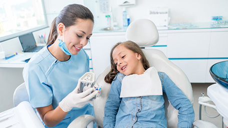 dentist with young patient