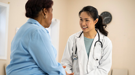 doctor talking to patient