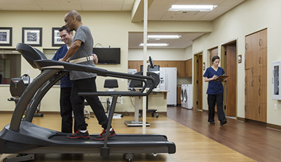 physical therapist with patient