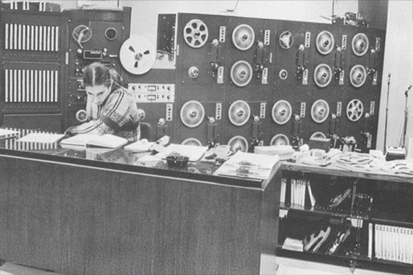 student working at at old computer