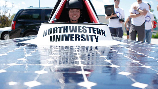 Photo of a girl in the solar car