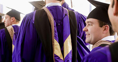 Graduation photo showing a happy graduate