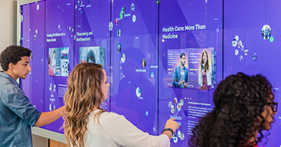 Students using interactive wall