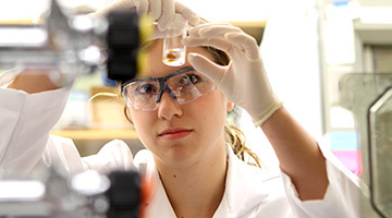 A student working with test tubes