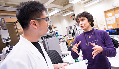 professor and student in a lab.