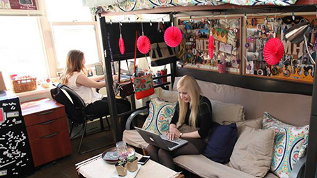 Students in a dorm room.