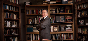 Gary Saul Morson in one of two libraries in his Evanston home. His basement library holds more than 7,000 volumes. Photo by Michael Goss