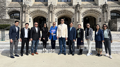 Delegation from Laos standing in front of Deering Librabry