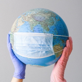 a globe covered by a mask