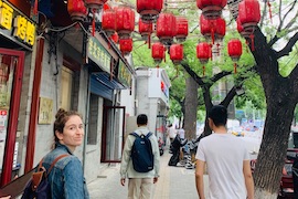 Pesek walks around downtown Beijing.