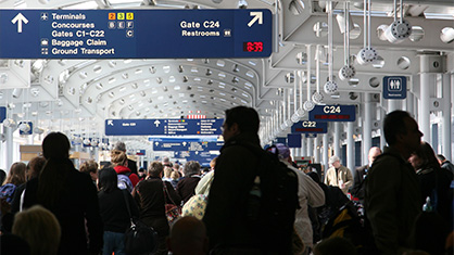 travelers at O'Hare airport in CHicago