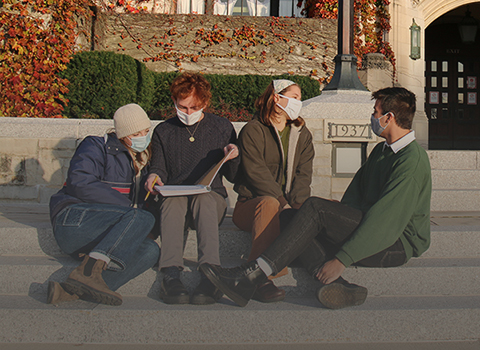 students outside in fall with masks on