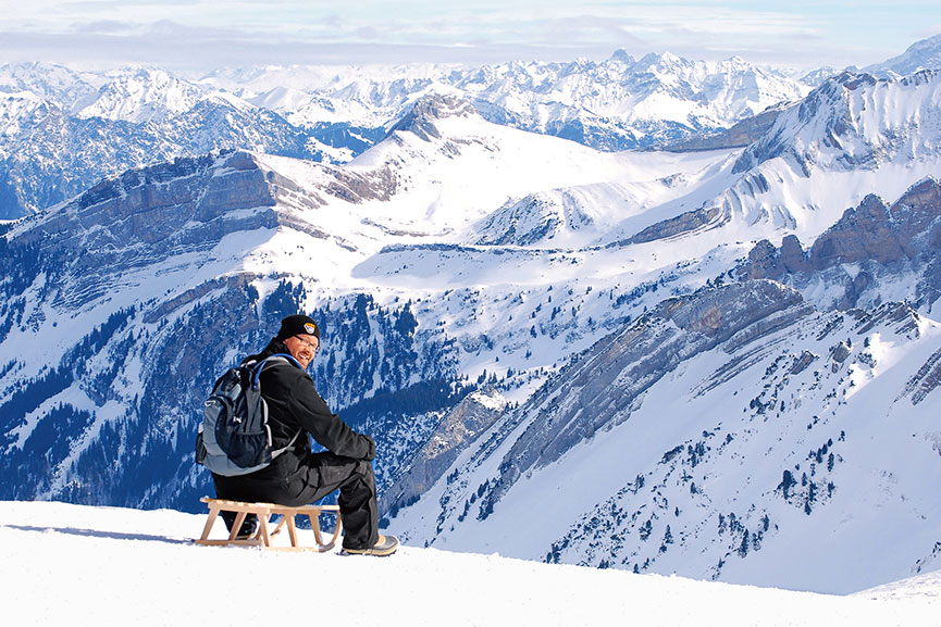 Joe Schwab ’99 on a Swiss-style toboggan on the Chäserrugg mountain, the “Top of Toggenburg,” in eastern Switzerland. He and his wife, Sarah Brezinski Schwab ’00, have three children, Emily, James and Henry.