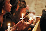 A moment at the Martin Luther King Jr. Candlelight Vigil. Photo by Michael Goss. 