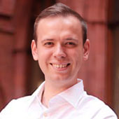 smiling white MSES program alumni