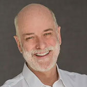 smiling white MSES professor
