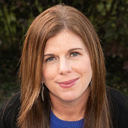 woman with brown hair smiling