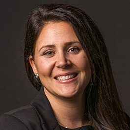 woman with long brown hair smiling