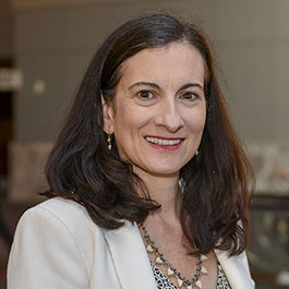 woman with brown hair smiling