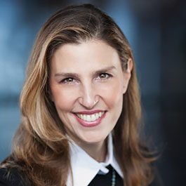woman with brown hair smiling
