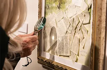guest looking at artwork