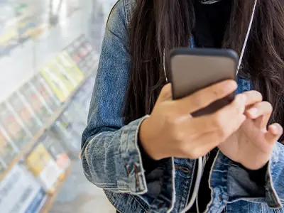 woman holding the phone