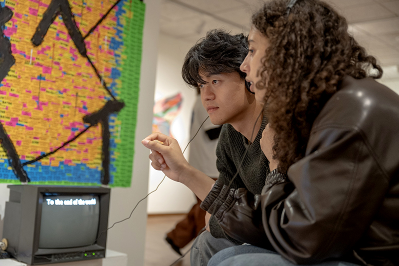 students at exhibit