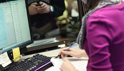 Cashier processing a transaction