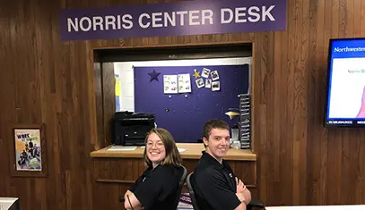 Staffers at the info desk