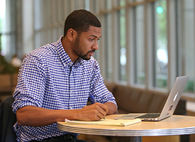 student at laptop