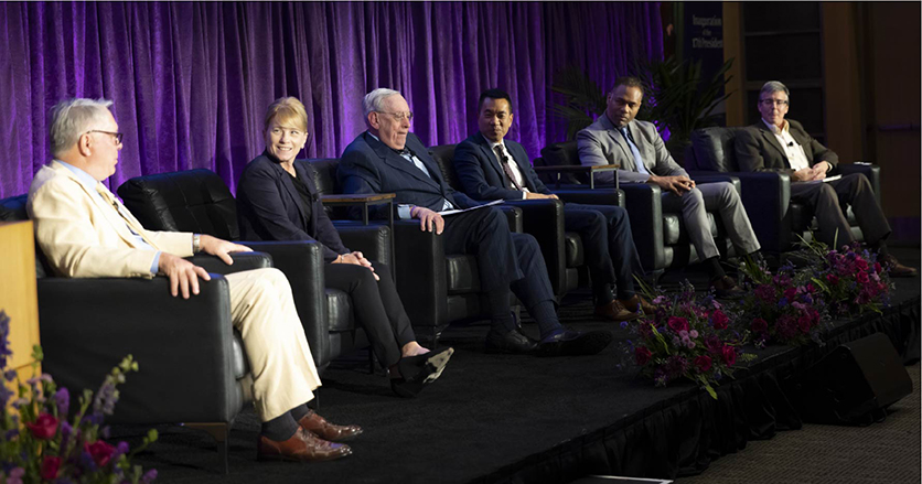 Faculty members on stage