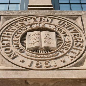 campus seal on building