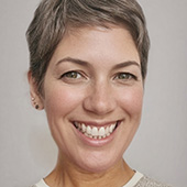 Amy Hauenstein smiles into the camera.