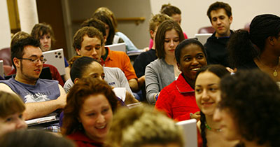 Undergraduates laughing in class