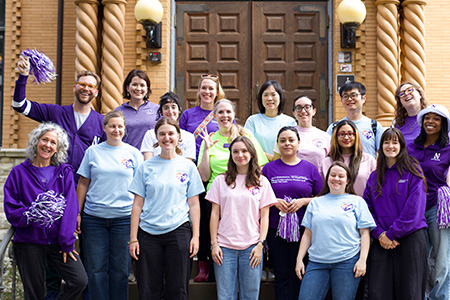 A group of people smiling
