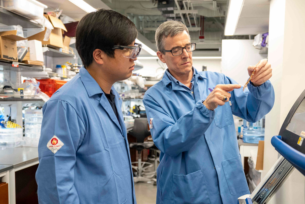 John Rogers and researcher in lab