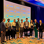 Attendees posing together at the BMES event
