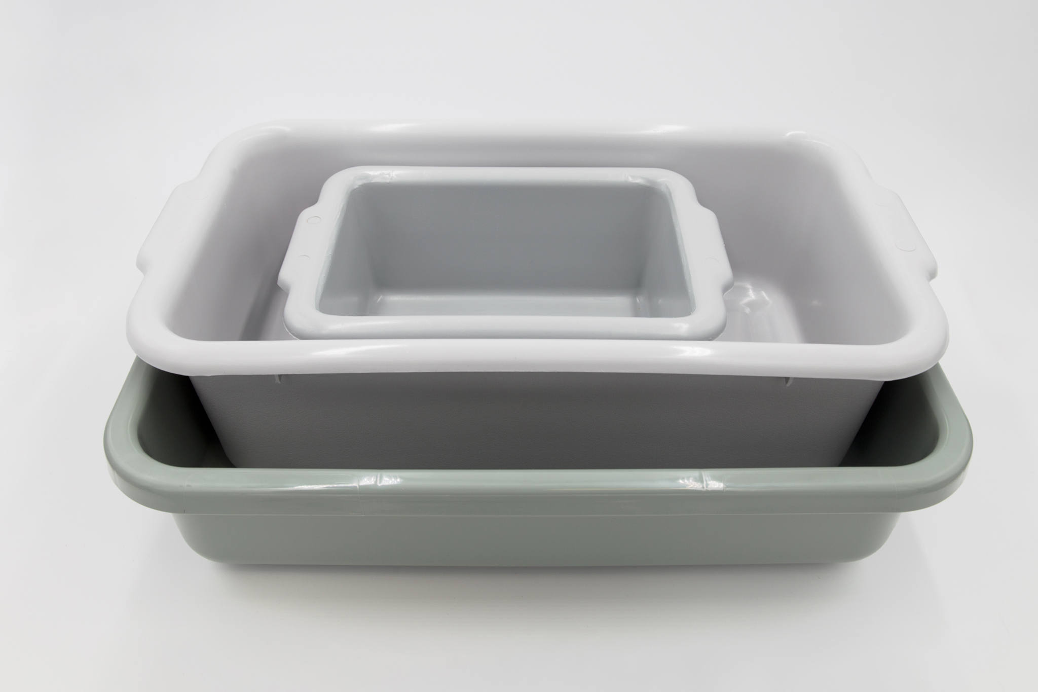Three spill trays stacked