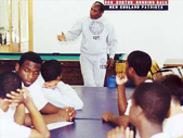 Ron Burton Sr. speaking at camp