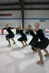 Synchronized skaters, from left to right, Lindsay Dean, Morgan Rowe, Kali Zhou and Courtney Wallace whip around the ice.