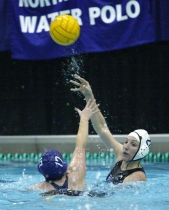 Joanna Bieri, a third-year graduate student in applied mathematics, tosses to a water polo teammate.