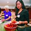 Carolyn Hall and students get acquainted during dessert