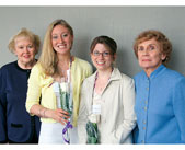 Alumnae members Linda Grube Eisenhauer (SESP59), far left, and Carol Erickson Gilbertson (WCAS55), far right, celebrate with, from left, Ashley Pasen and Jessica Joslin.