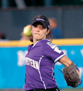 Right fielder Erin Dyer returns a ball to the infield during the Women