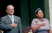 Rigoberta Mench, right, 1992 Nobel Peace Prize laureate, sings the national anthem next to Guatemala