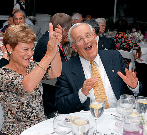 Patricia and Don Honig (McC56) applauding at the 50th reunion party at the Westmoreland Country Club