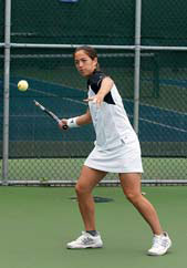 Cristelle Grier prepares for a forehand shot.