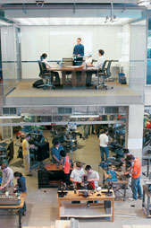 With the prototyping shop below and the conference room above, the Ford Design Center offers space for the key elements of engineering education.