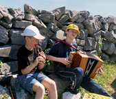 Young Irish musicians play along the path to Dn Aengus, the cliffside fortress on Inishmore.