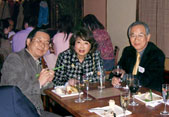 Teruaki Aoki, right, and his wife, Reiko, enjoy Thanksgiving in Tokyo with a member of the NU Club of Japan.